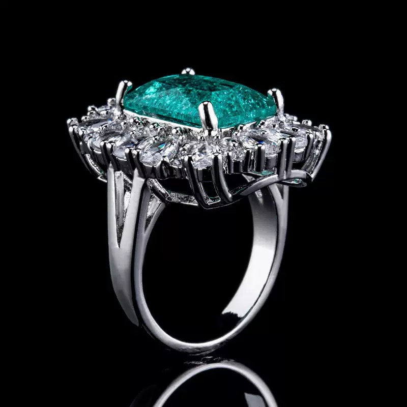 Lake-green crackle-pattern ring with dazzling sparkle.